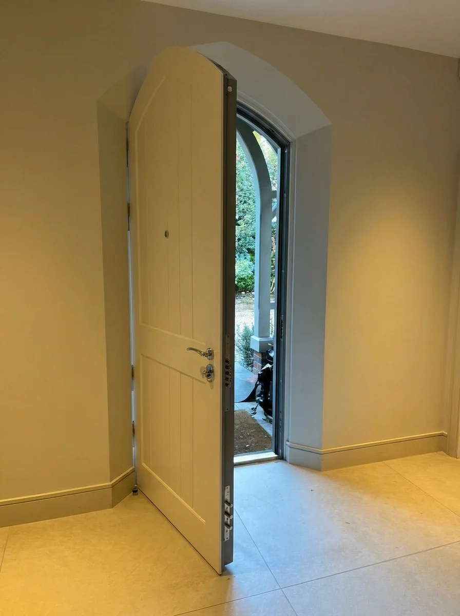 Arched Steel Front Door, Exterior View London Residence